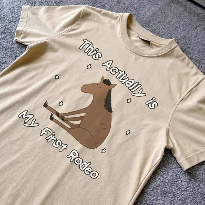 

Футболка унисекс «Это actually is my first rodeo» с изображением лошади, мем, ковбой, глупый шут, странная