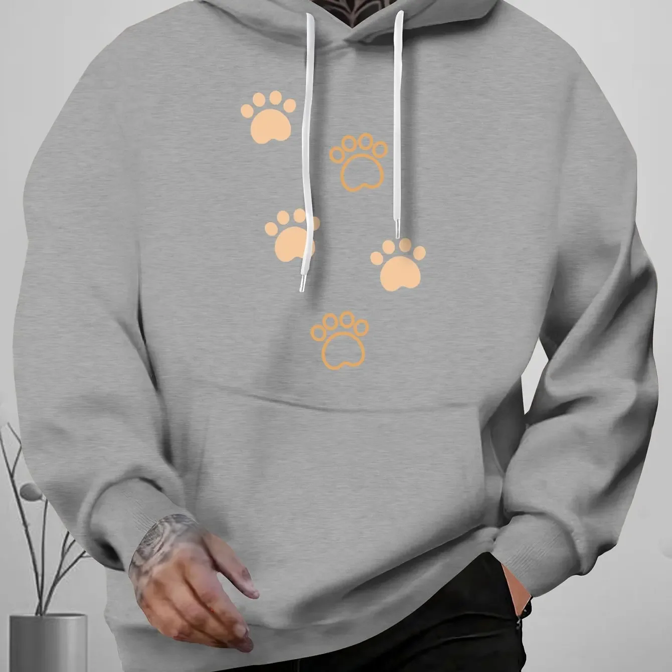 A StylishOversizedMen'SHoodie Featuring Retro Pocket Drawstring Decorations And a Easy Cat Paw Print Design Perfect for Everyday
