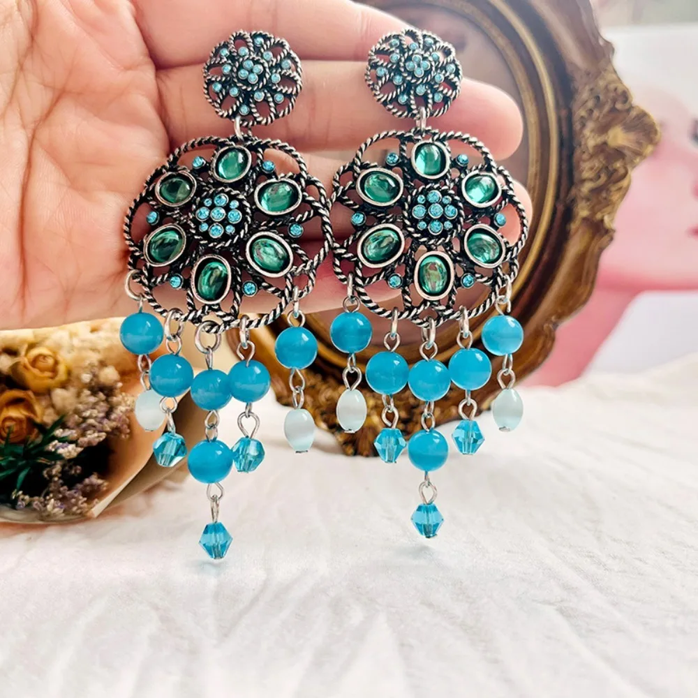 

Retro Tassel Earrings Blue Cat Eye Beads Tassels Antique Silver Plated Hollow Pattern Flower Rhinestone Paved Statement Earrings