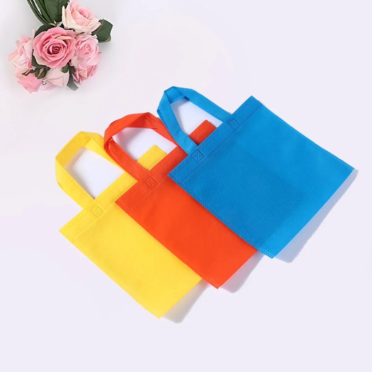 5pcs 25*25cm borsa per la spesa in tessuto Non tessuto di colore puro borsa a mano di grande capacità borsa pieghevole impermeabile ecologica