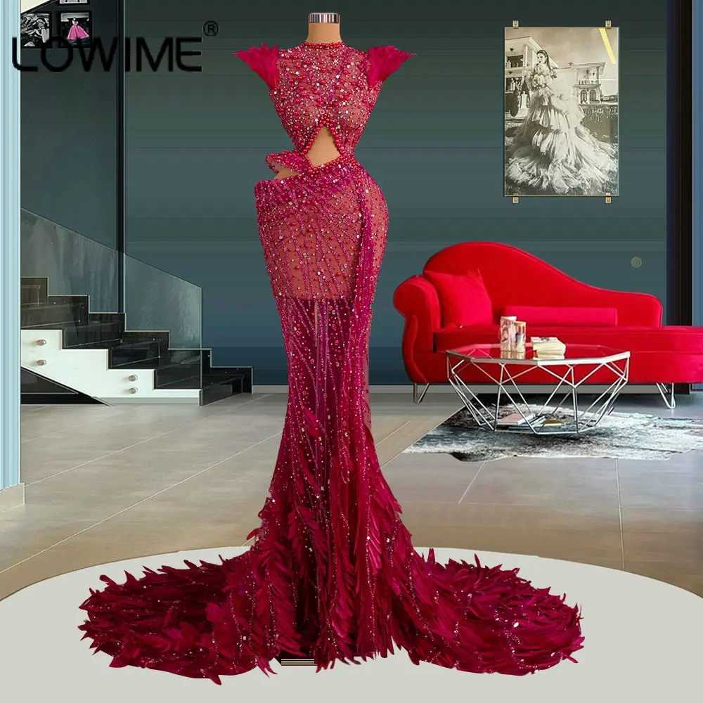 Dubai Arabic Luxury Hot Pink Feathers Long Mermaid Evening Dresses Turkey Sexy Cut Out Crystals Beaded Sequins Ceremony Gowns