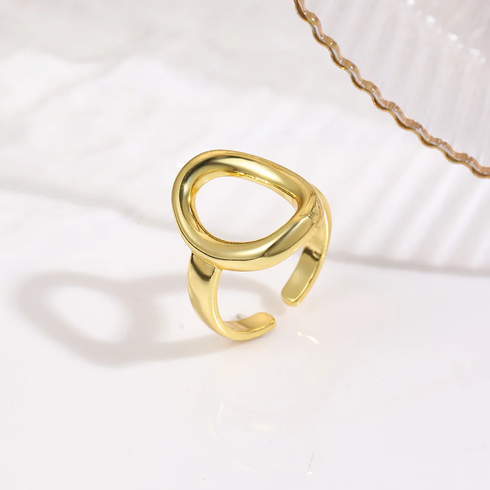 Personalized fashion geometric smooth oval open ring copper light luxury hollow simple adjustable men's and women's ring jewelry
