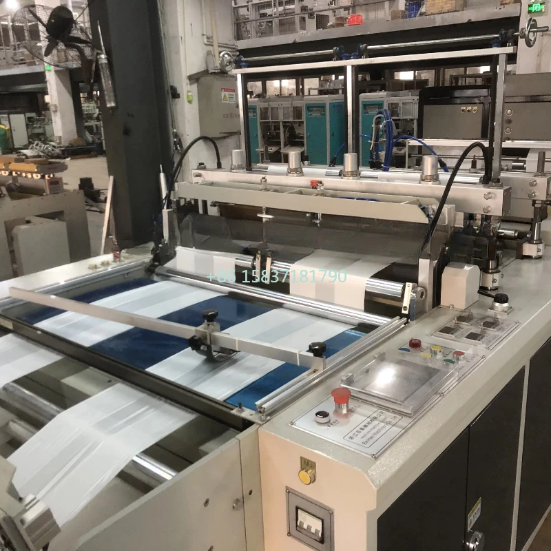 Full Automatic Paper Slitting Machine High Speed Heat Slitting Double Lanes T-shirt Bag on Roll Core Coreless Making Machine
