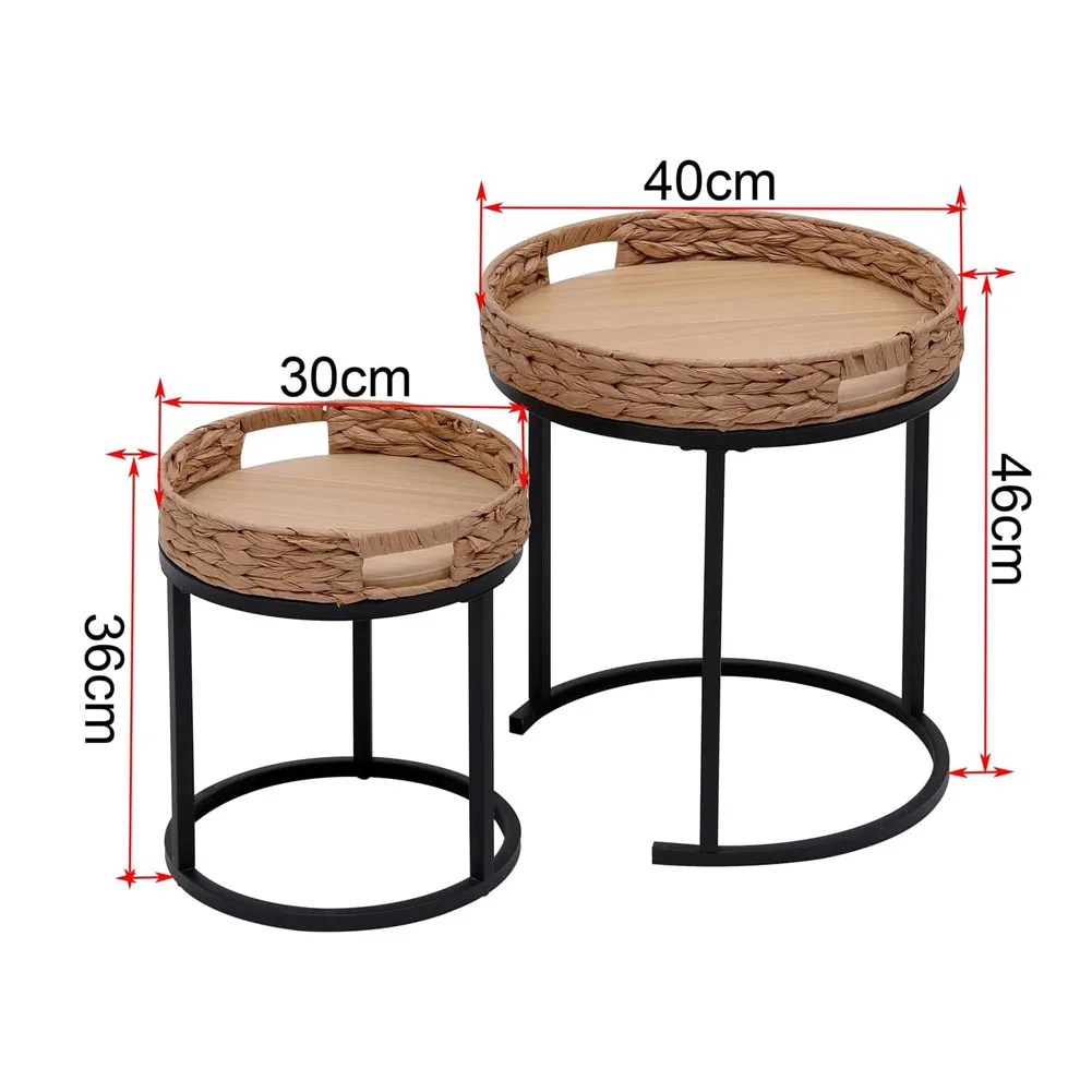 High-angle view of round nesting end table tray top with teacup