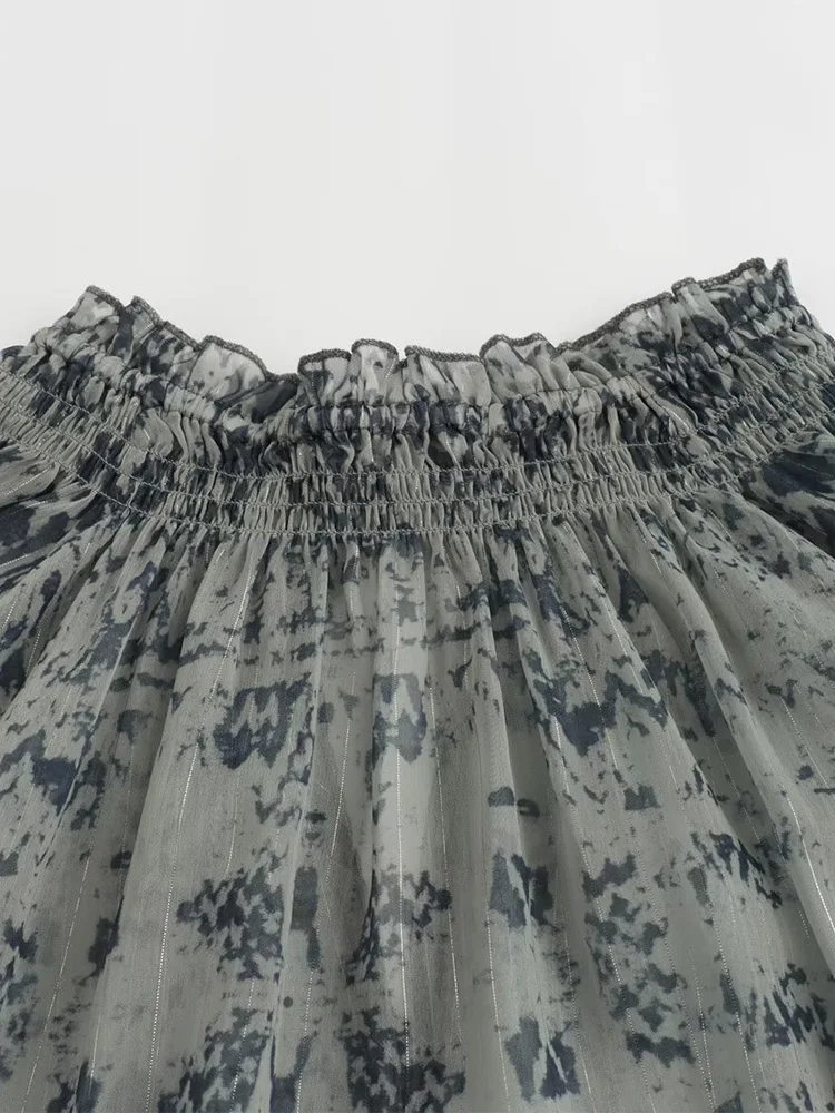 2025 Camicia a maniche lunghe ampia con stampa di linee di colore metallizzato alla moda in stile europeo e americano delle nuove donne