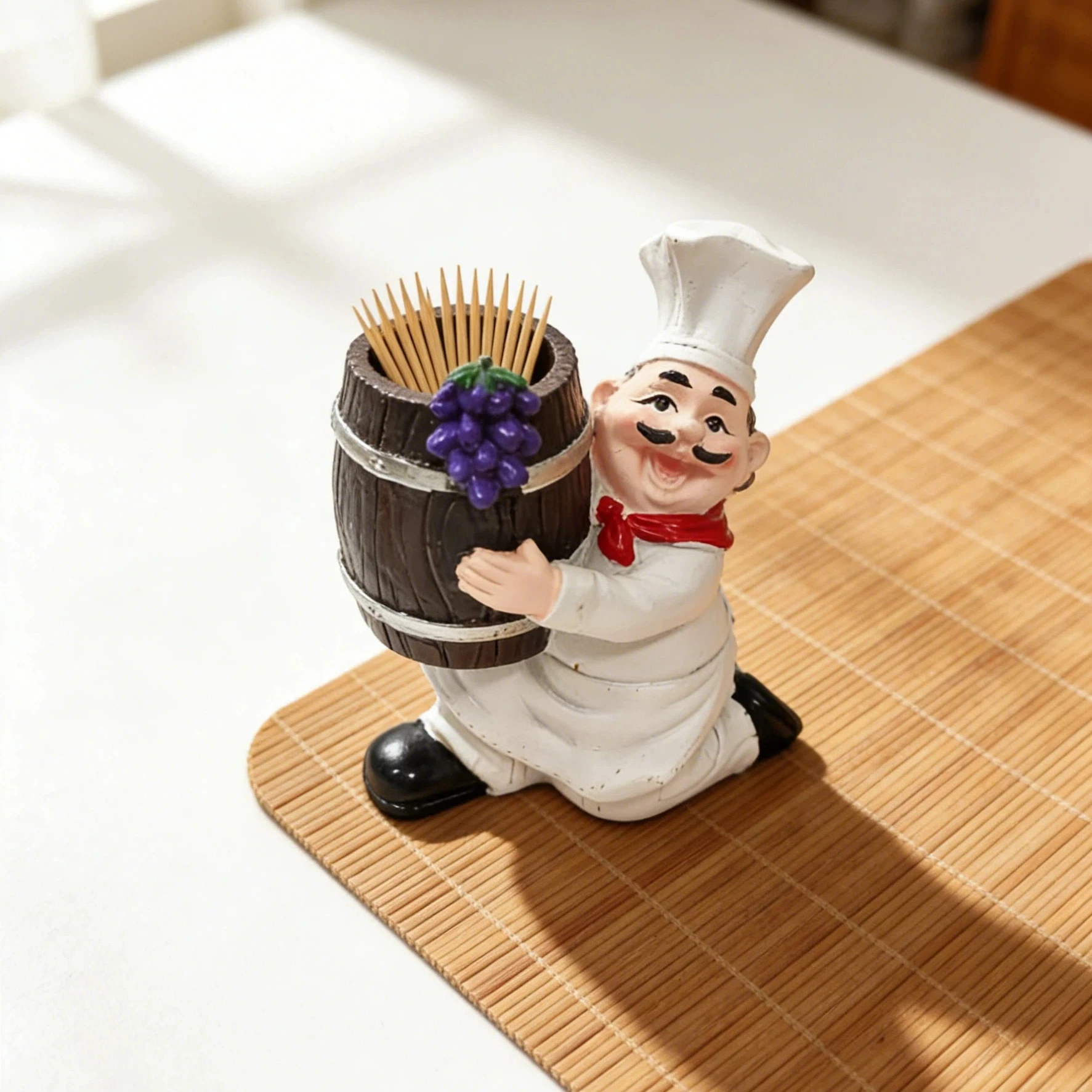 1 piece, hand-painted chef holding a wine barrel toothpick holder ornament, high-quality resin chef statue decorative craft, finely detailed chef figure with grape pattern, rich colors that are resistant to fading and wear, ideal for home, kitchen, and restaurant table decoration, creative display piece for Western restaurants and bars, exclusive gift for birthdays, holidays, housewarming, and business openings, a unique gift idea for handcraft enthusiasts