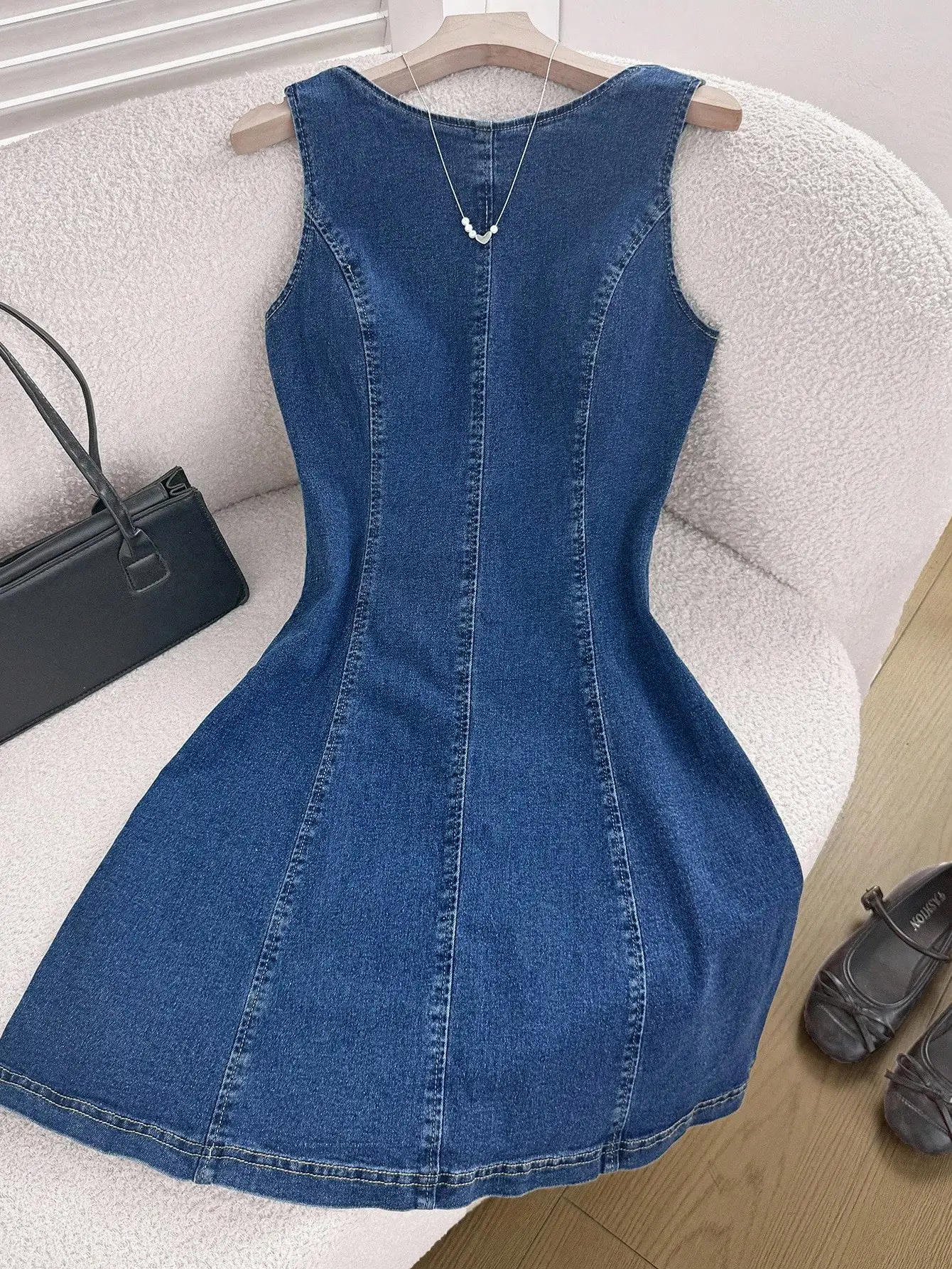 

Blue Sleeveless Denim Mini Dress With Round Neck, Open Back Tie-Up Detail, A-Line Fit For Summer Casual Wear