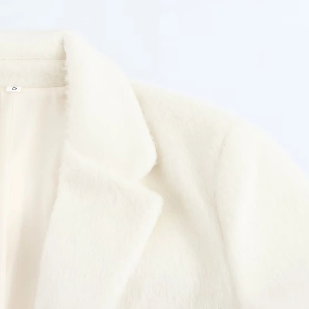 Haut ample en fourrure pour femmes, avec revers, manches longues, poche à boutons, nouveau style, veste de costume élégante, automne et hiver