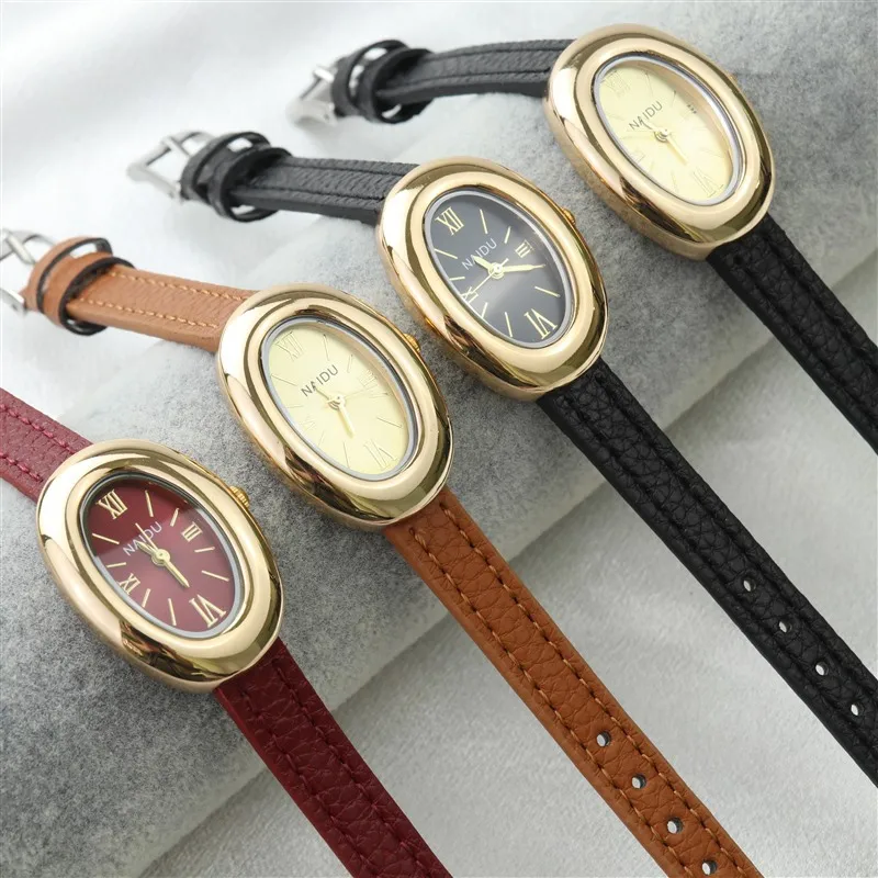 

Изысканные часы с овальным циферблатом, женские часы для девочек, простой кожаный ремешок, кварцевые наручные часы, минималистичный стиль Часы Женские