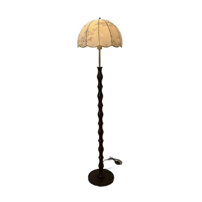

French antique living room floor lamp, high-end sofa next to several bedrooms vertical desk lamp