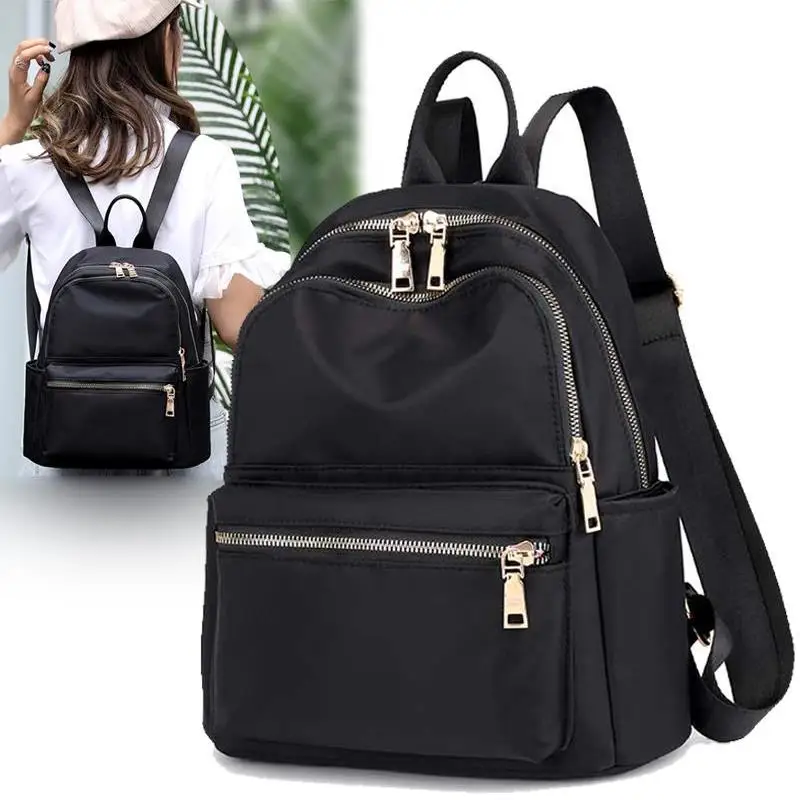 

New men's and women's universal travel Oxford cloth small backpack all fashion canvas small schoolbag daily travel essential