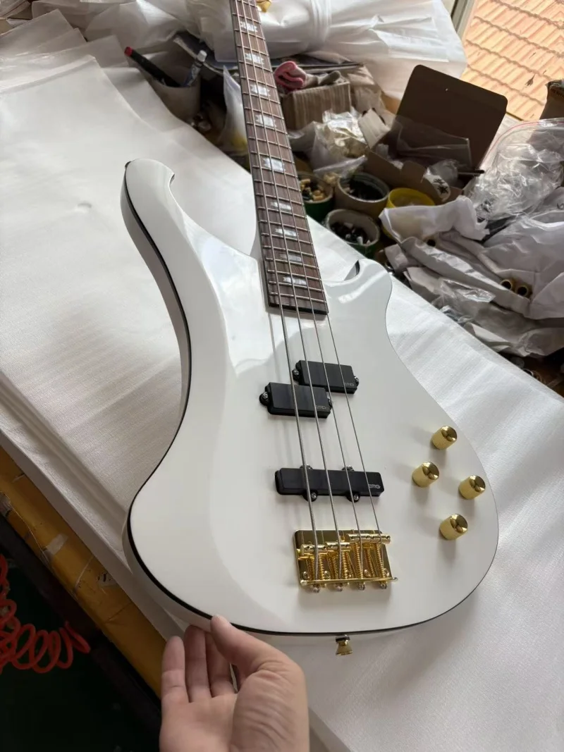 White 4-string electric bass, rosewood fingerboard, gold hardware, active pickup, solid wood quality, free delivery