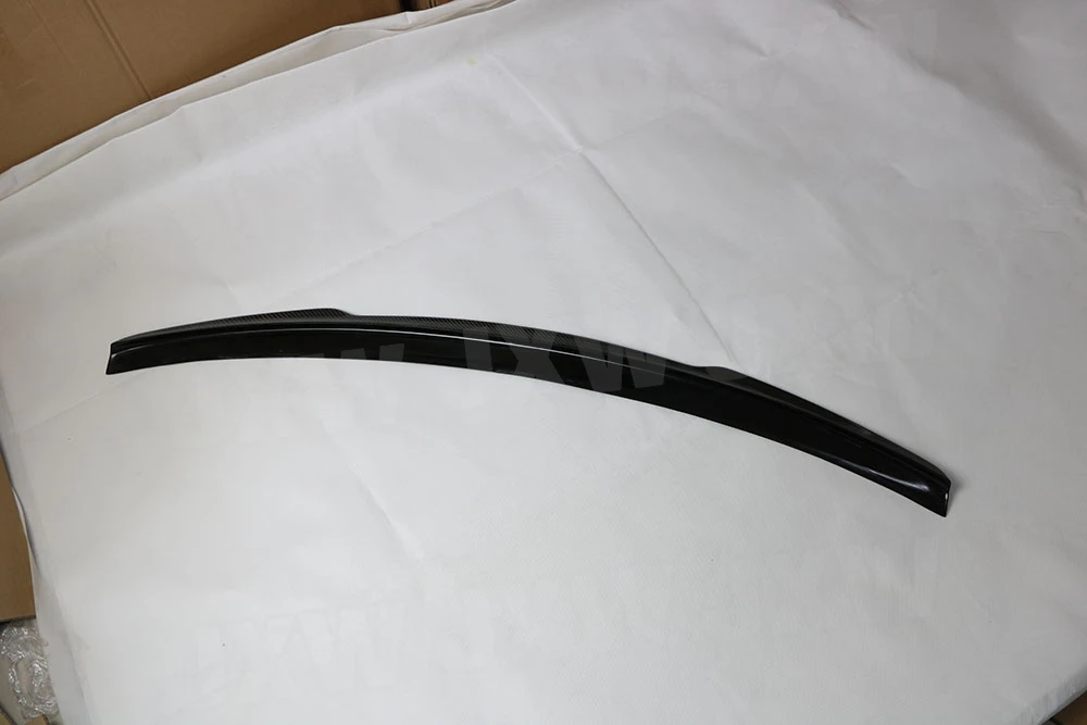 JCHEY ألياف الكربون الخلفية الشفاه المفسد ل جاكوار XE سيدان 4-Door 2015-2018 الخلفي الجذع أجنحة السيارة ABS لمعان أسود