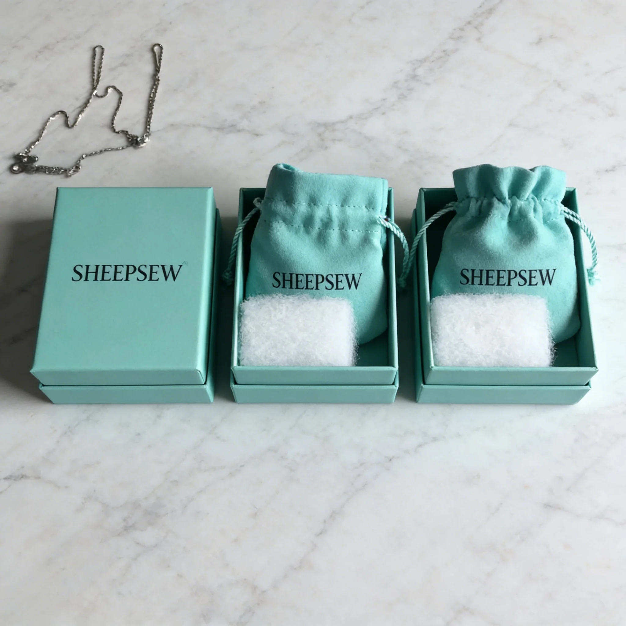 

SHEEPSEW Beautiful Jewelry Packaging Custom Printing Silver Brand Logo, Luxury Blue Jewelry Box With Bag For Ring Necklace Earri