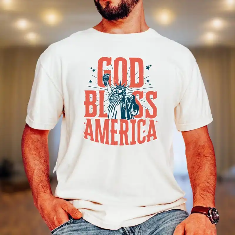 Comfort Colors® God Bless America Shirt: Statue of Liberty Patriotic Tee ,Graphic Short Sleeve Crew Neck Cotton T-Shirt