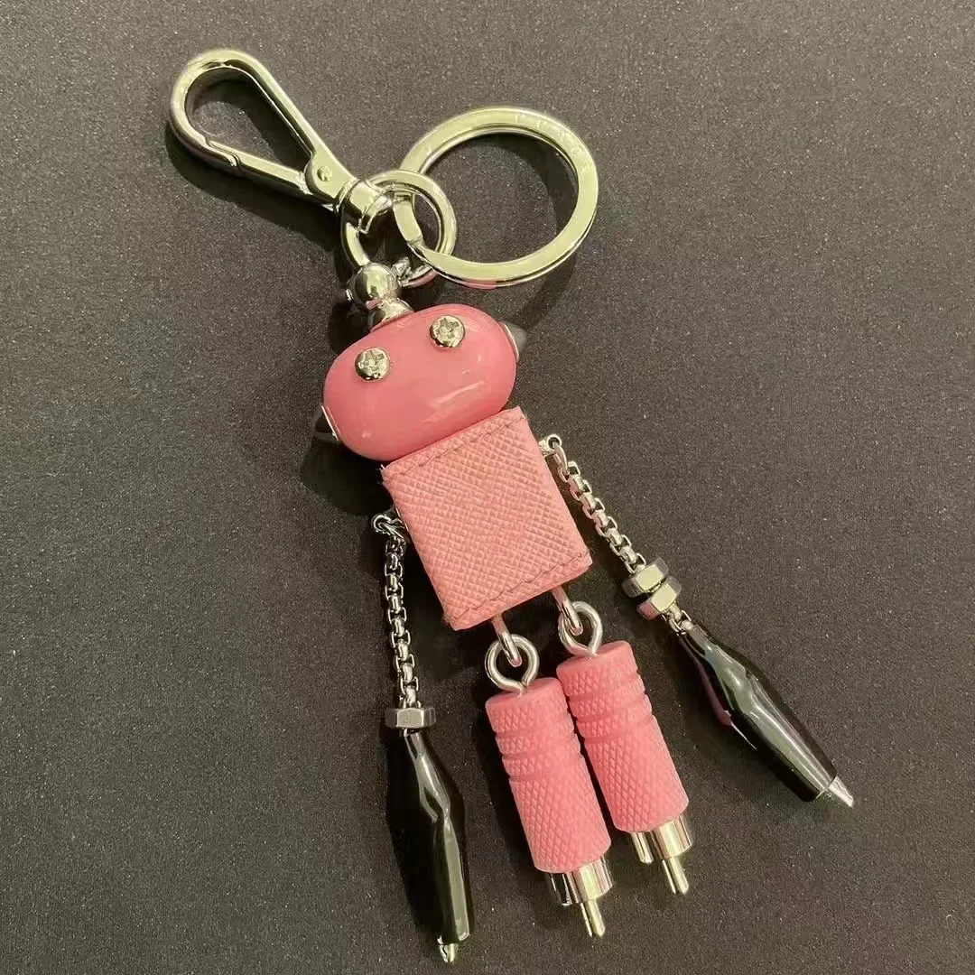 

Geek Chic роботизированный эмалированный брелок с подвеской и кожаной кисточкой, сумка, аксессуар, зажим для мужчин