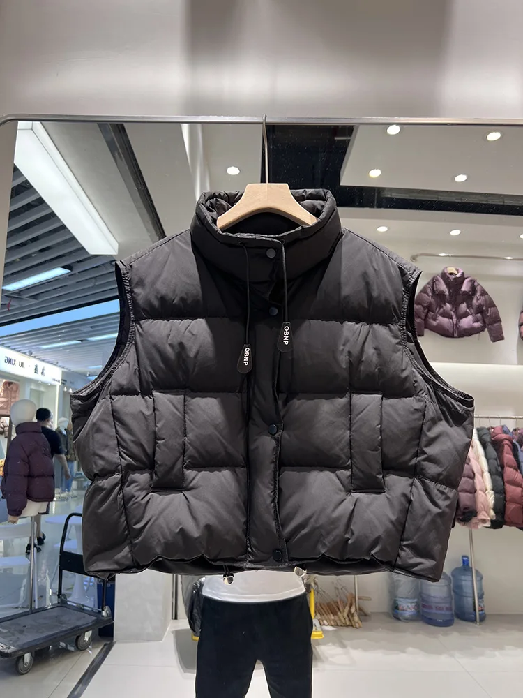 Women's short style stand collar down jacket vest 2025 winter new fashion design loose white duck down jacket trend