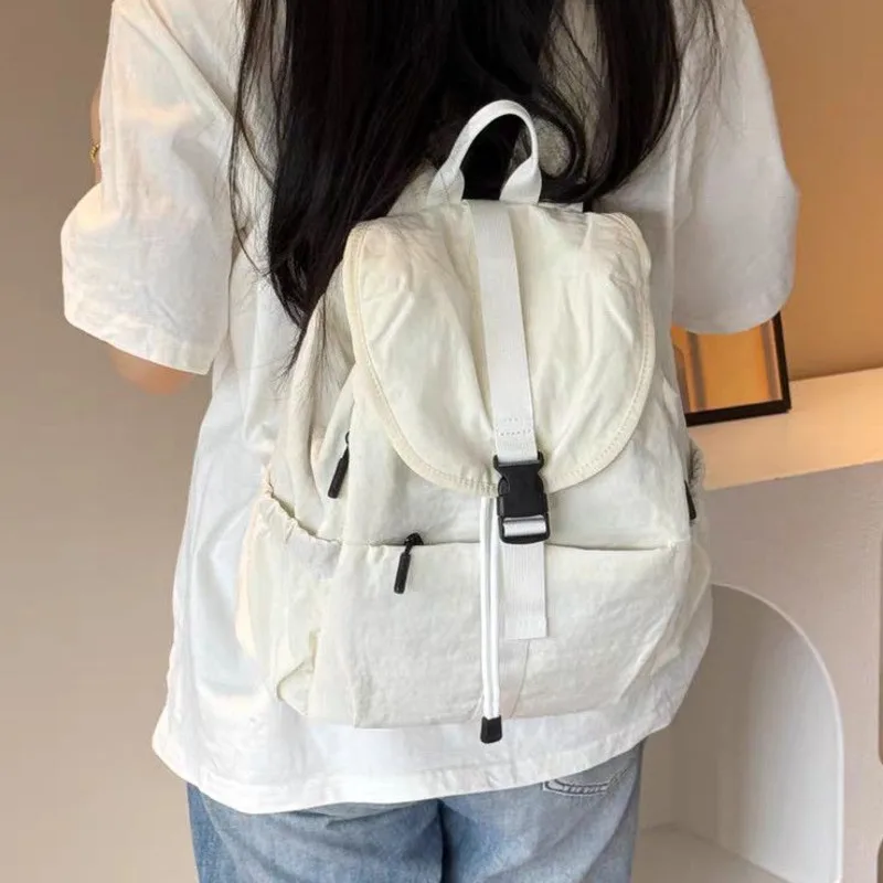 

Новый легкий рюкзак с несколькими карманами, повседневный дорожный рюкзак, простой стиль, версия с клапаном на шнурке, мужские и женские стили