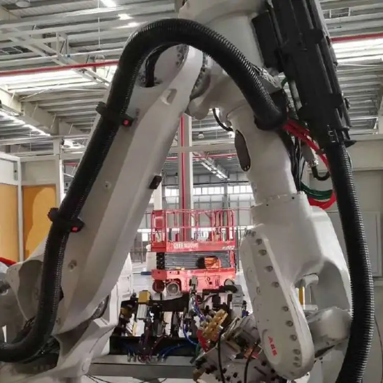 Customized Robot Dress Pack with Protective Arms for Industrial Welding Robots, Improves Cable Management and Safety