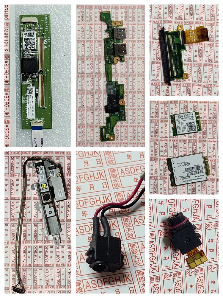 Fujitsu/Fujitsu Q775 notebook tablet with various small boards, cameras, network cards, power interfaces, and audio interfaces