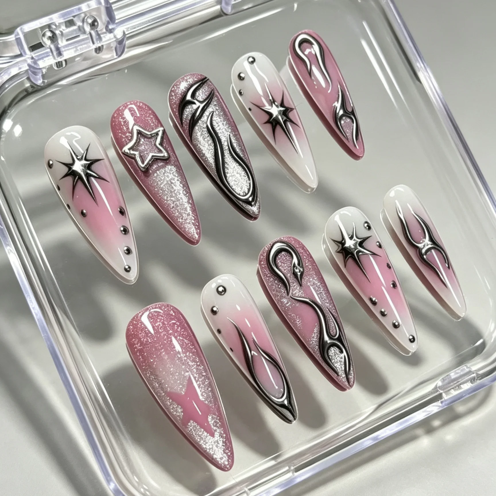 10 pièces de faux ongles en forme d'amande pressés à la main, magnifiques faux ongles, dégradé noir rose, étoiles argentées, adaptés aux femmes