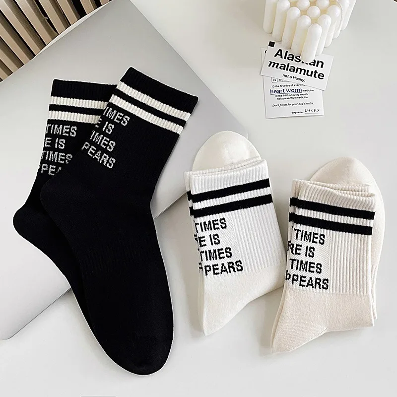 3 pairs of sports mid-calf socks hundred letters English