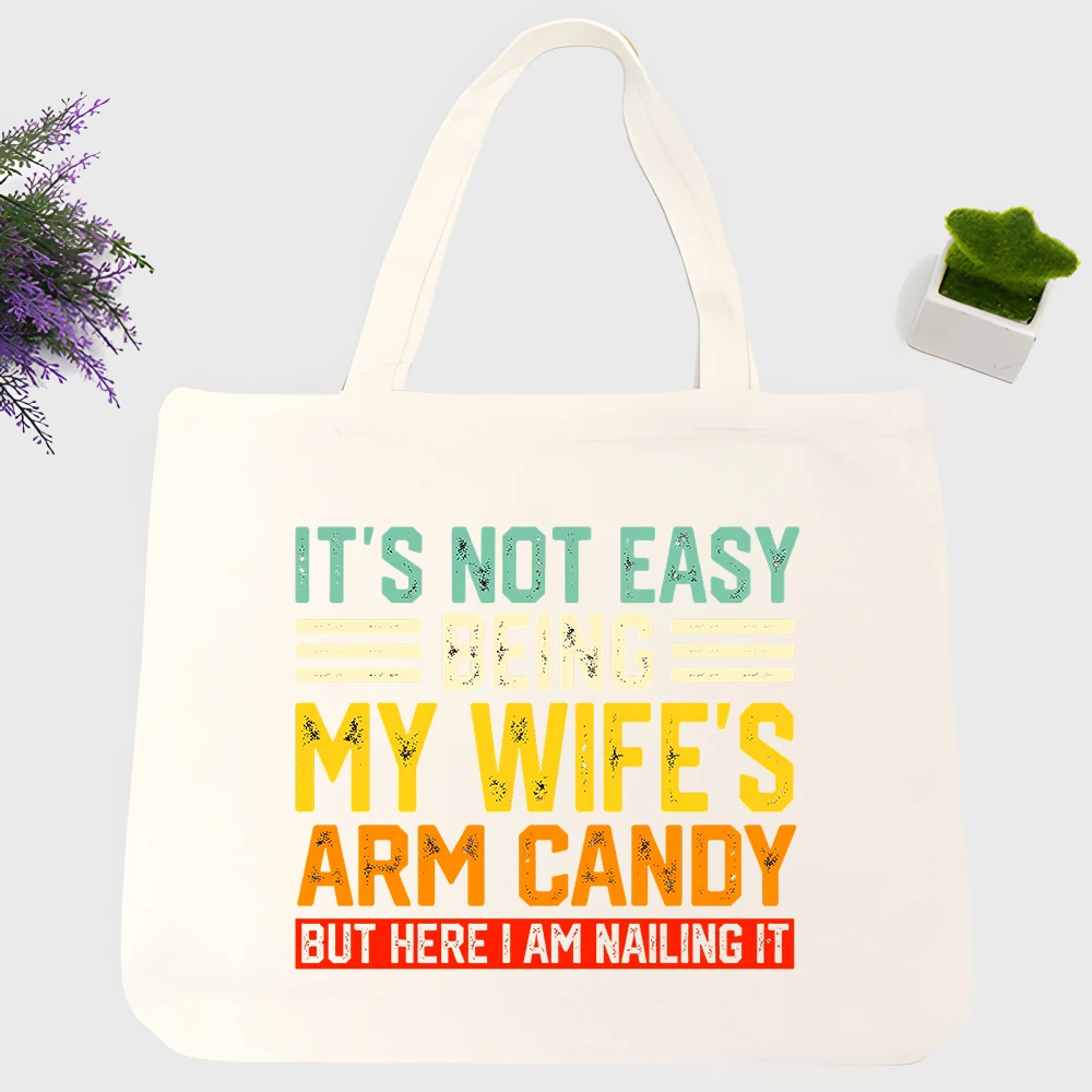 Men's slogan-style graphic canvas tote bag, casual street-style for daily shopping and weekend outings