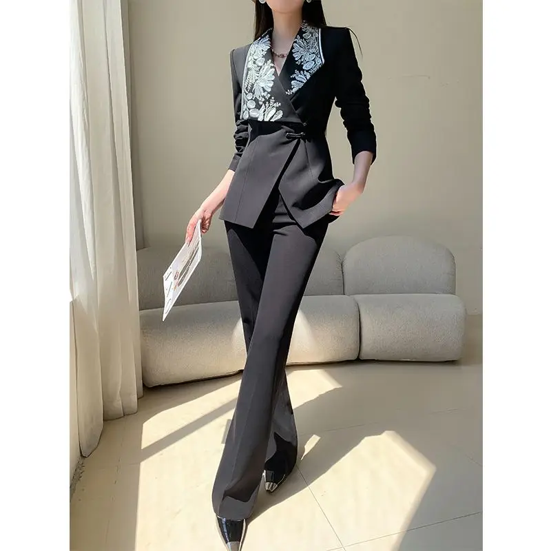 New Chinese Style 2026 Spring And Autumn New Suit Women's Embroidery Haute Couture Buckle Suit White Bell Pants Two-Piece Set