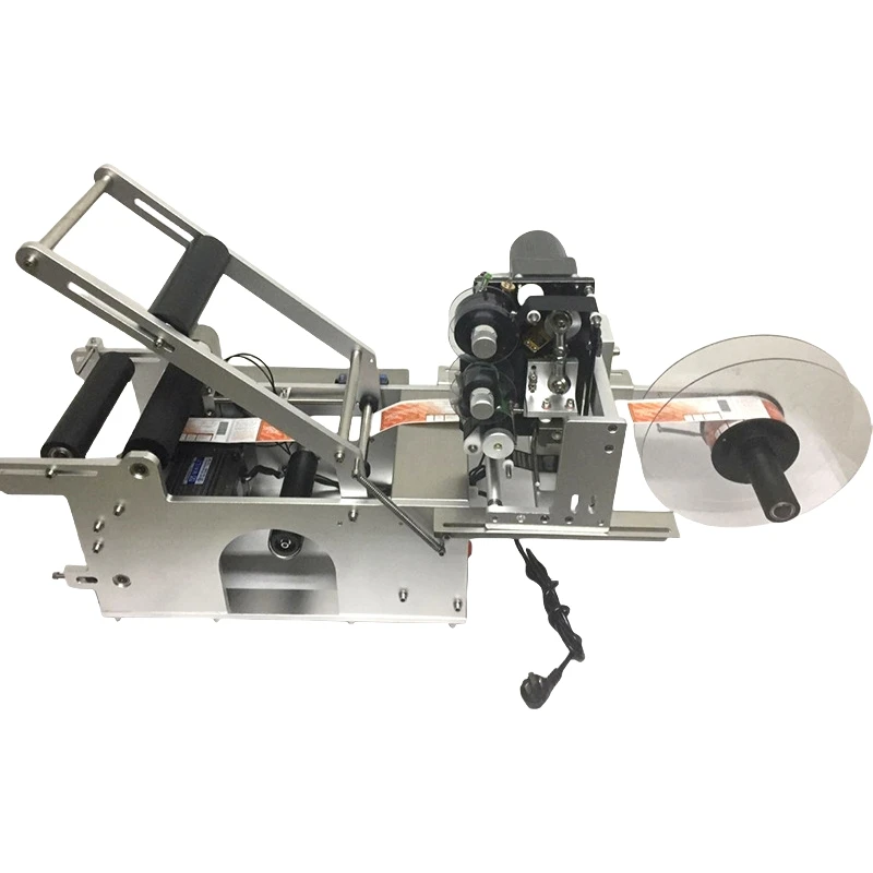 

Semi-automatic manual bottle packaging labeling machine for glass and plastic bottle date printing functions