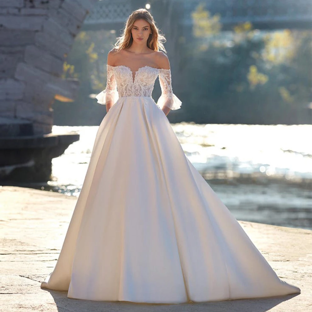 Off the Shoulder A-Line Wedding Dress Short Flare Sleeves with Applique and Pocket Floor Length Bridal Satin Sweep Train Gowns