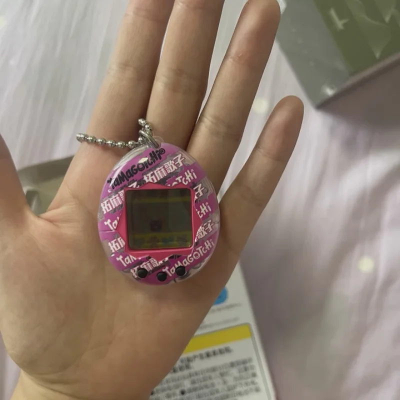 

Оригинальная электронная игрушка Тамагочи, модный мультяшный брелок, классическая игрушка, вызывающая воспоминания о детстве, для девочек и мальчиков, праздничный подарок