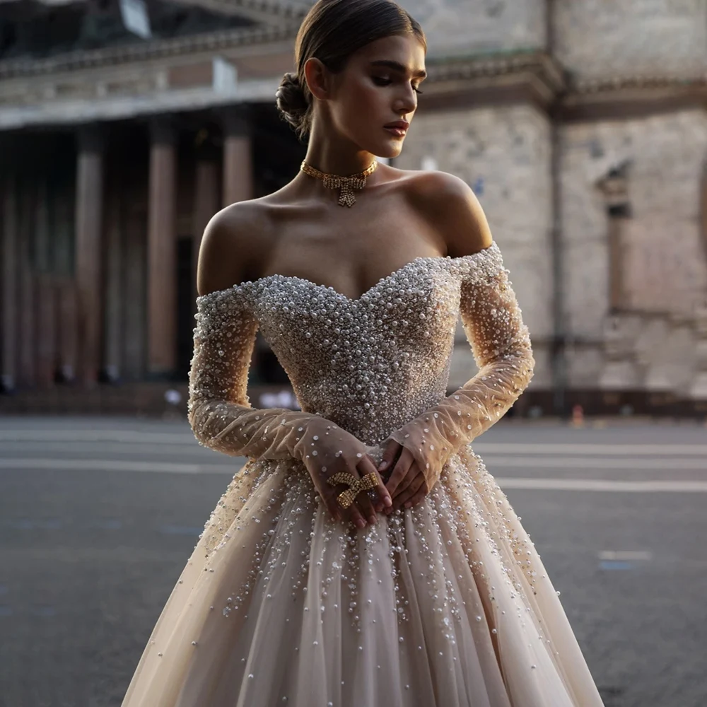 Luxury A Line Bridal Gowns 2024 Boat Neck Long Sleeve Backless Bead Wedding Dress Customized High Quality Princess Bride Dress