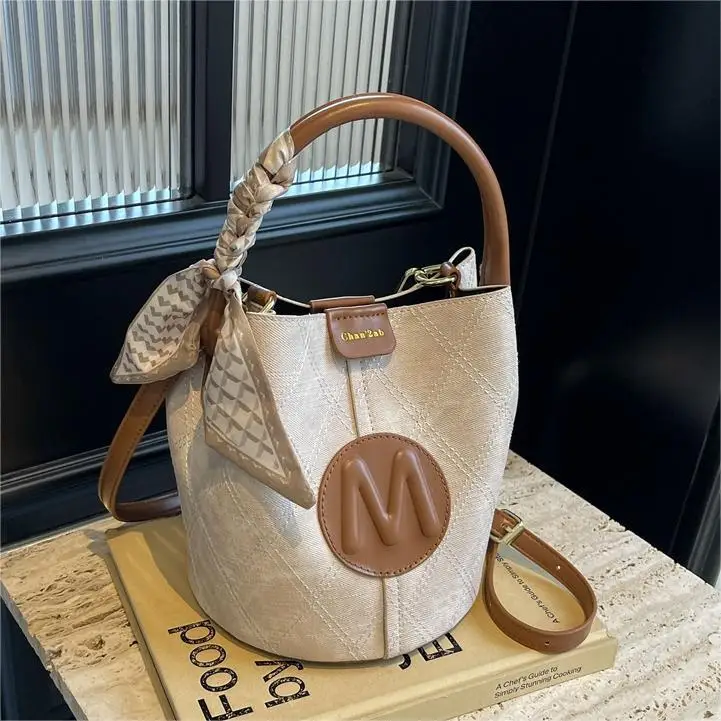 

Популярная женская сумка 2025 года — высококачественная джинсовая сумка-ведро, универсальная текстурированная сумка-мессенджер