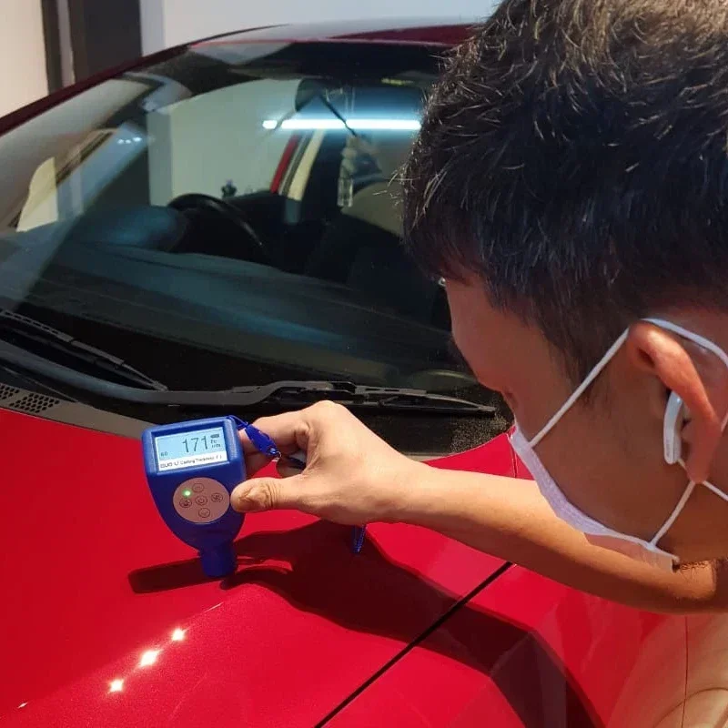 

car detailing care polishing paint thickness gauge