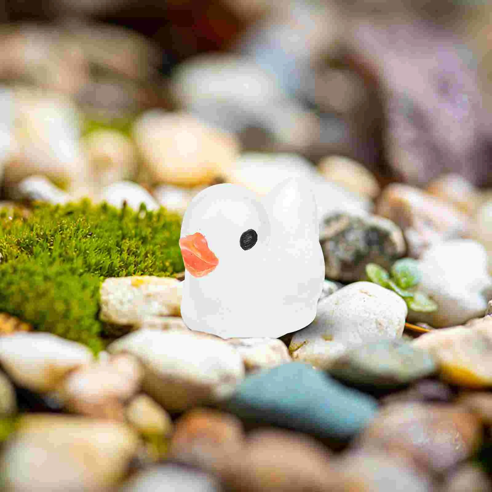 100 Stück Auto leuchtende Ente Ornament Mini Spielzeug Enten verstecken Harz Miniatur Cartoon Figuren