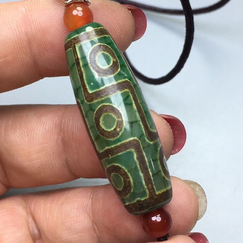 The New Hetian Jade Agate Nine-eye Dzi Bead Pendant Is The Same for Men and Women.