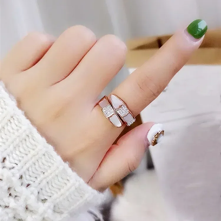 

New Fine Jewelry Snake-Shaped Ring for Women Crystal from Austrian Individually Set on Natural Shell Titanium Steel Sale Item