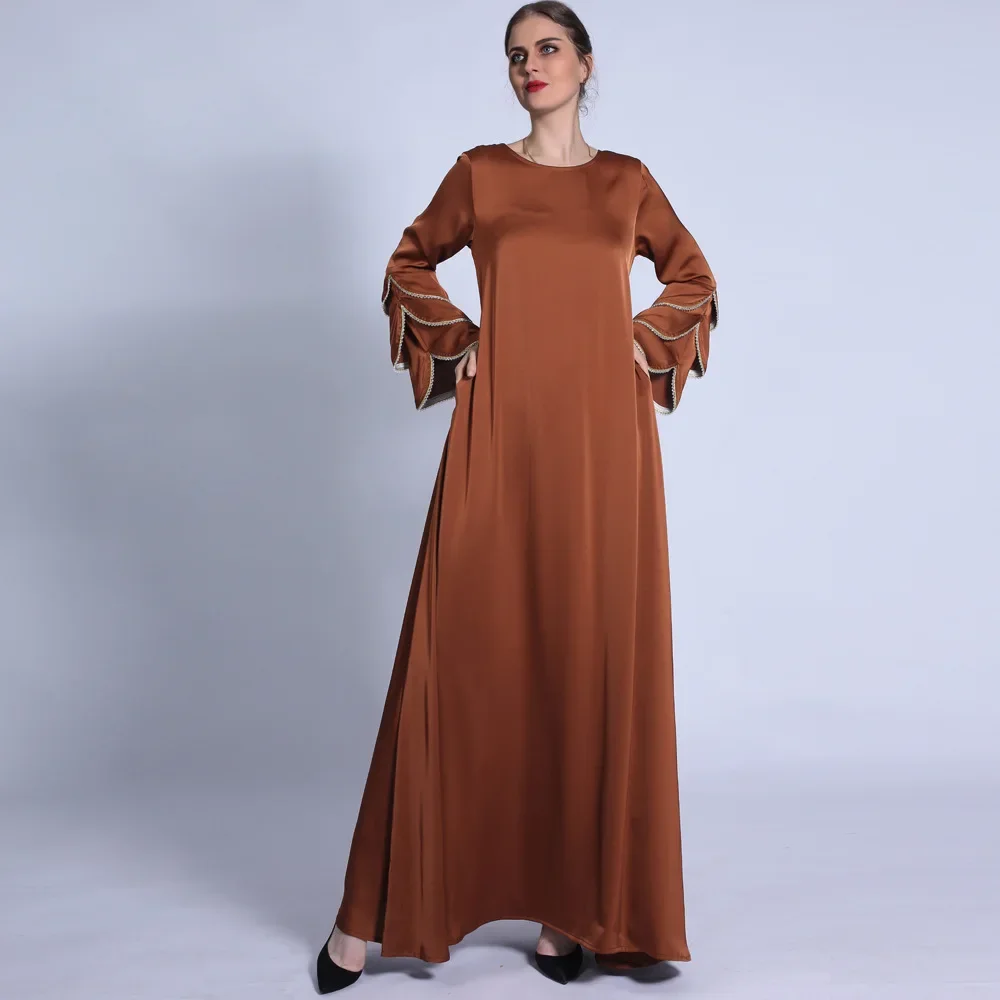 Moda fosco vestido muçulmano elegante brilhante frisado a linha mulher fishtail manga de três camadas vestido solto vestido de festa de férias