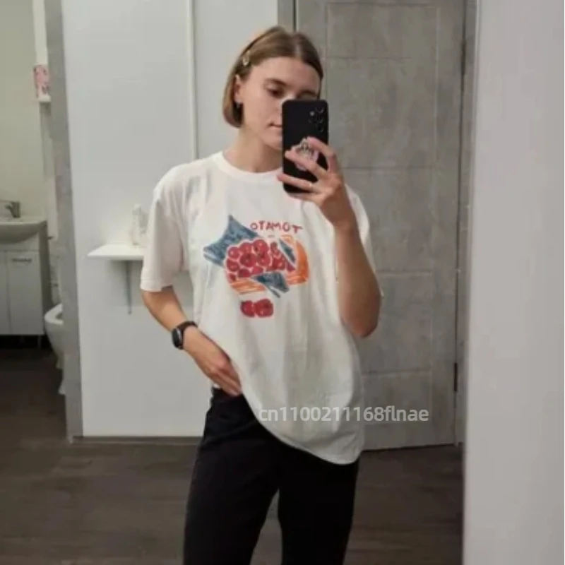 เสื้อยืดแขนสั้นผ้าไหมนมพิมพ์ลายสไตล์เกาหลี รุ่นใหม่ประจำฤดูร้อนปี 2025 สำหรับผู้หญิง สวมใส่สบาย