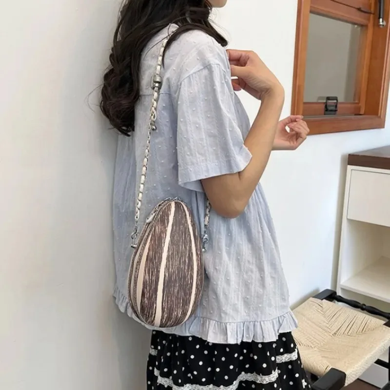 

Fashion Personalized Design Unique Melon Seeds Crossbody Bags for Women Textured Striped Mini Purse with Silver Chain Strap Bag