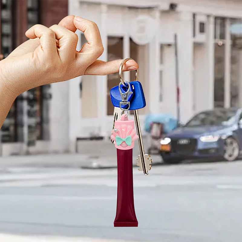 シェル型のリボン結びシリコンキーホルダー、リップグロスアクセサリー、携帯用ホルダーペンダント、口紅、ランヤード、バッグに適合