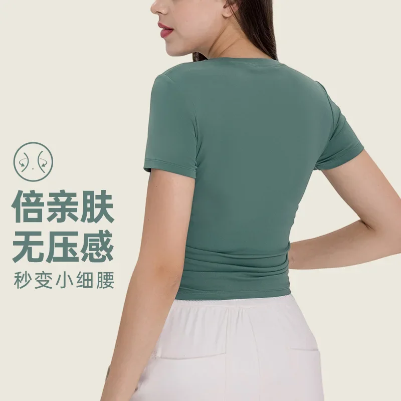 Creora Xiaoxing's new fashionable pleated sports short sleeved slim fit yoga top for women Slimming and slimming women's top