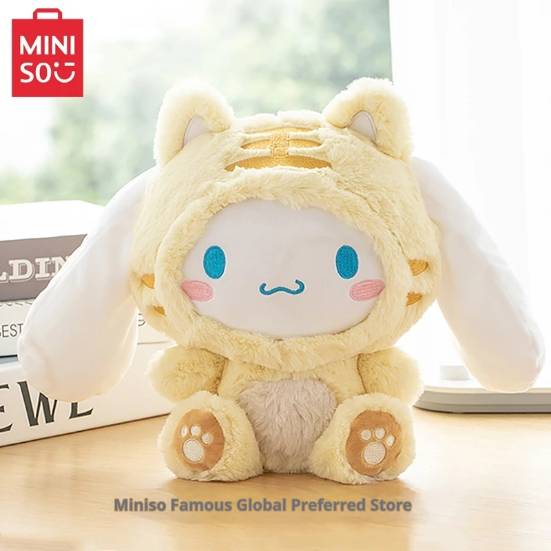 MINISO Sanrio Cinnamoroll serie muñeco de peluche pequeño tigre auriculares canela muñeca sentada muñeca súper linda muñeca de tela regalo de cumpleaños