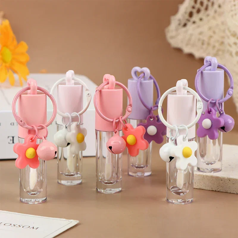 หลอดลิปกลอสทรงหัวใจสีชมพูขนาด 2.5 มล. พร้อมพวงกุญแจและแปรง หลอดลิปกลอสเปล่า ภาชนะใส่ลิปกลอส อุปกรณ์แต่งหน้า