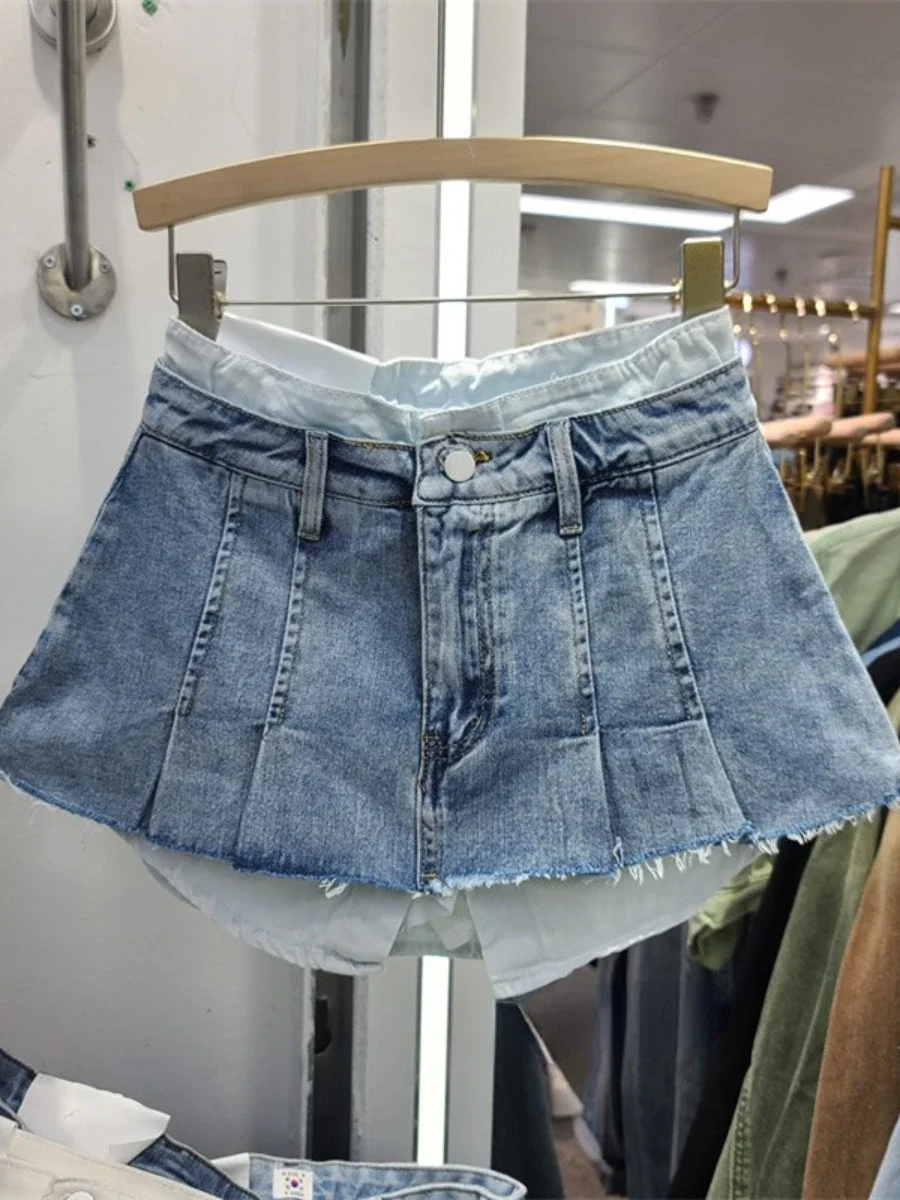 2023 frühling Retro Hohe Taille Abnehmen Unregelmäßigen Einen Schritt Mantel Kurze Denim Rock für frauen Ausgefranste Mini Rock Weibliche faldas