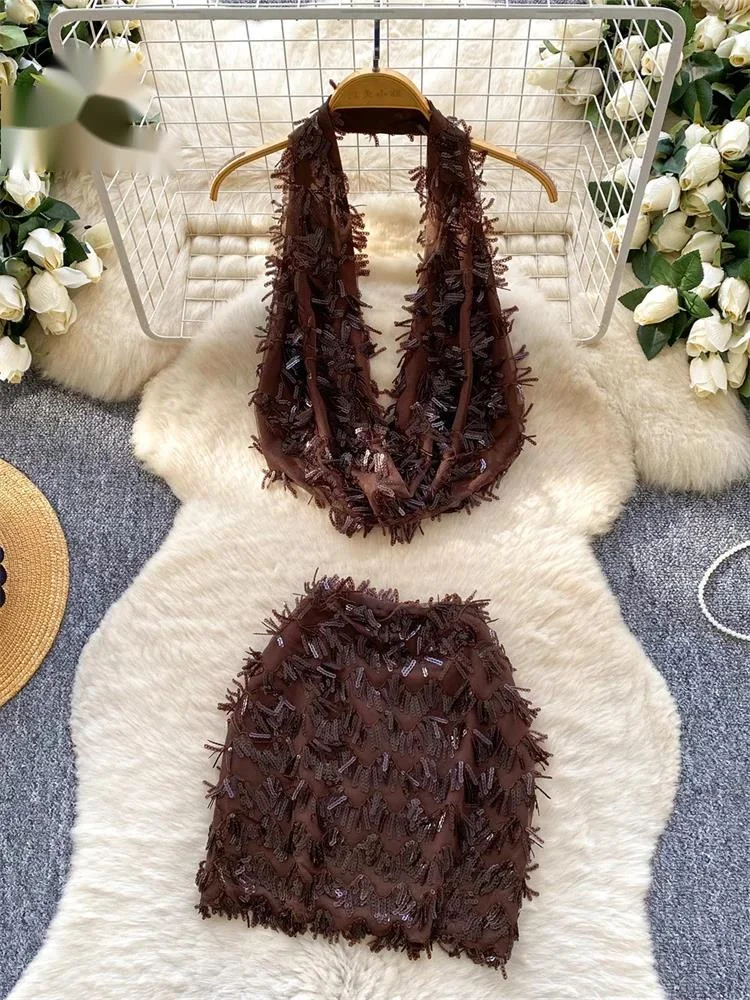 

Женский комплект с пайетками: топ-халтер с открытыми плечами и облегающая юбка. Летний пляжный сексуальный костюм в американском стиле.