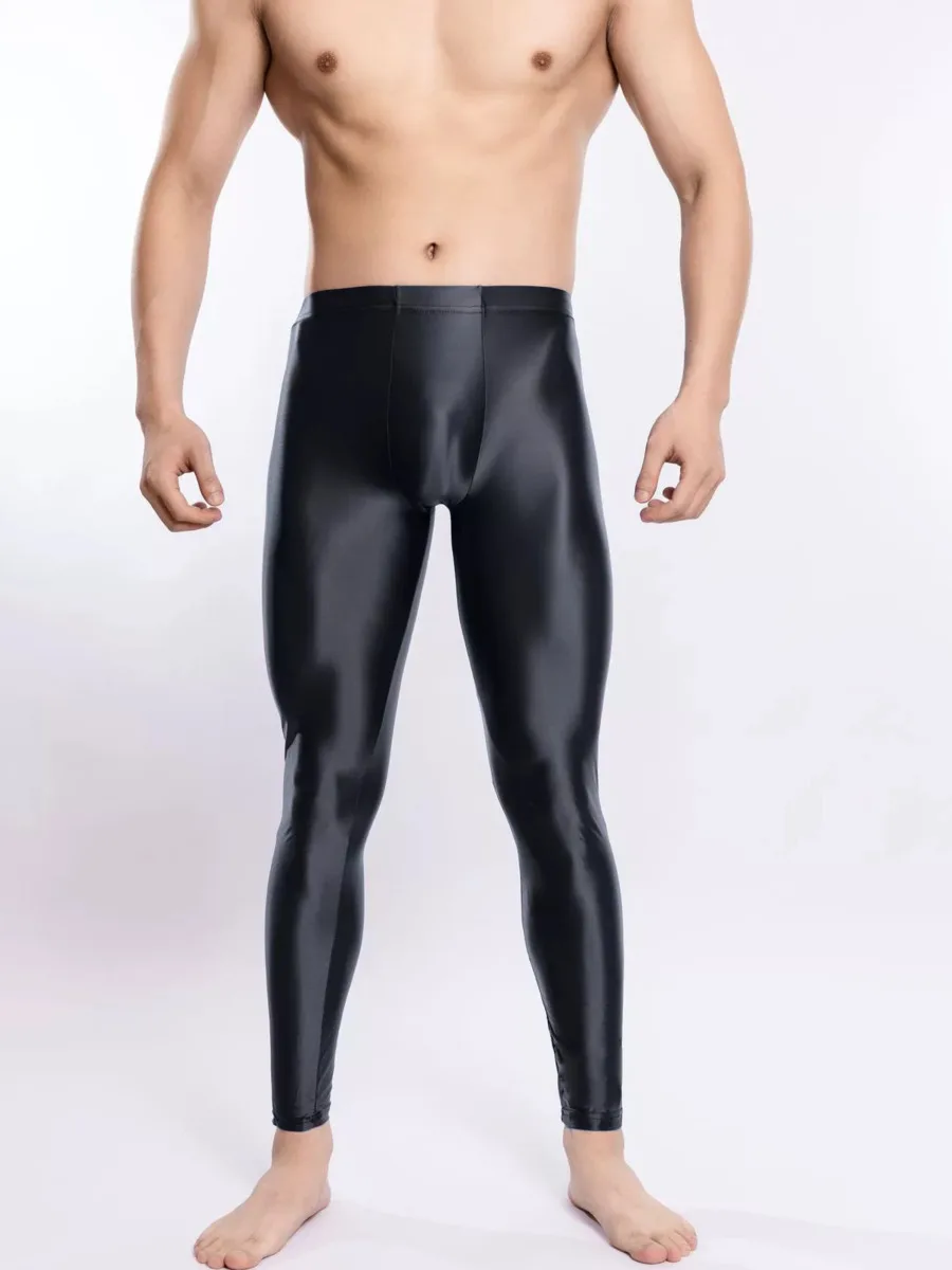 

Плюс размер глянцевые гладкие бодибилдинг девятиточечные брюки с мешочком U выпуклые мужские тонкие горячие сексуальные брюки 2025 новинка ZB8R