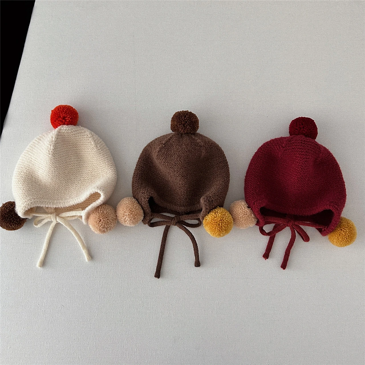  Cute Plush Ball Baby Ear Protection Cap Winter Warm Toddler Knit Hat Solid Color Woolen Headgear Bonnet 0-3Year Kids Beanies
