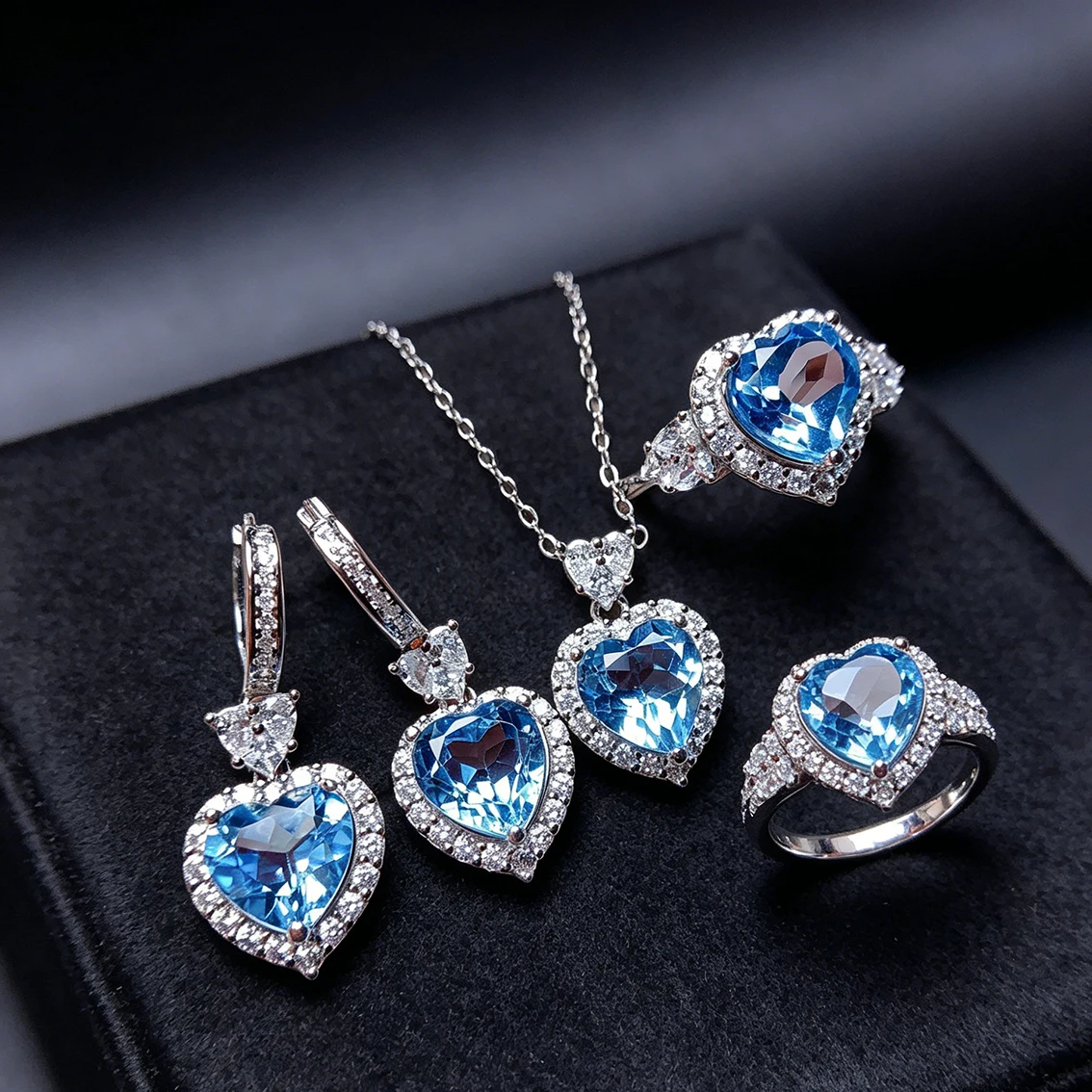 

Роскошный комплект украшений из 3 предметов с голубым топазом для женщин: ожерелье, серьги и кольцо с серебряным покрытием, идеально подходят для свадьбы и вечеринки.