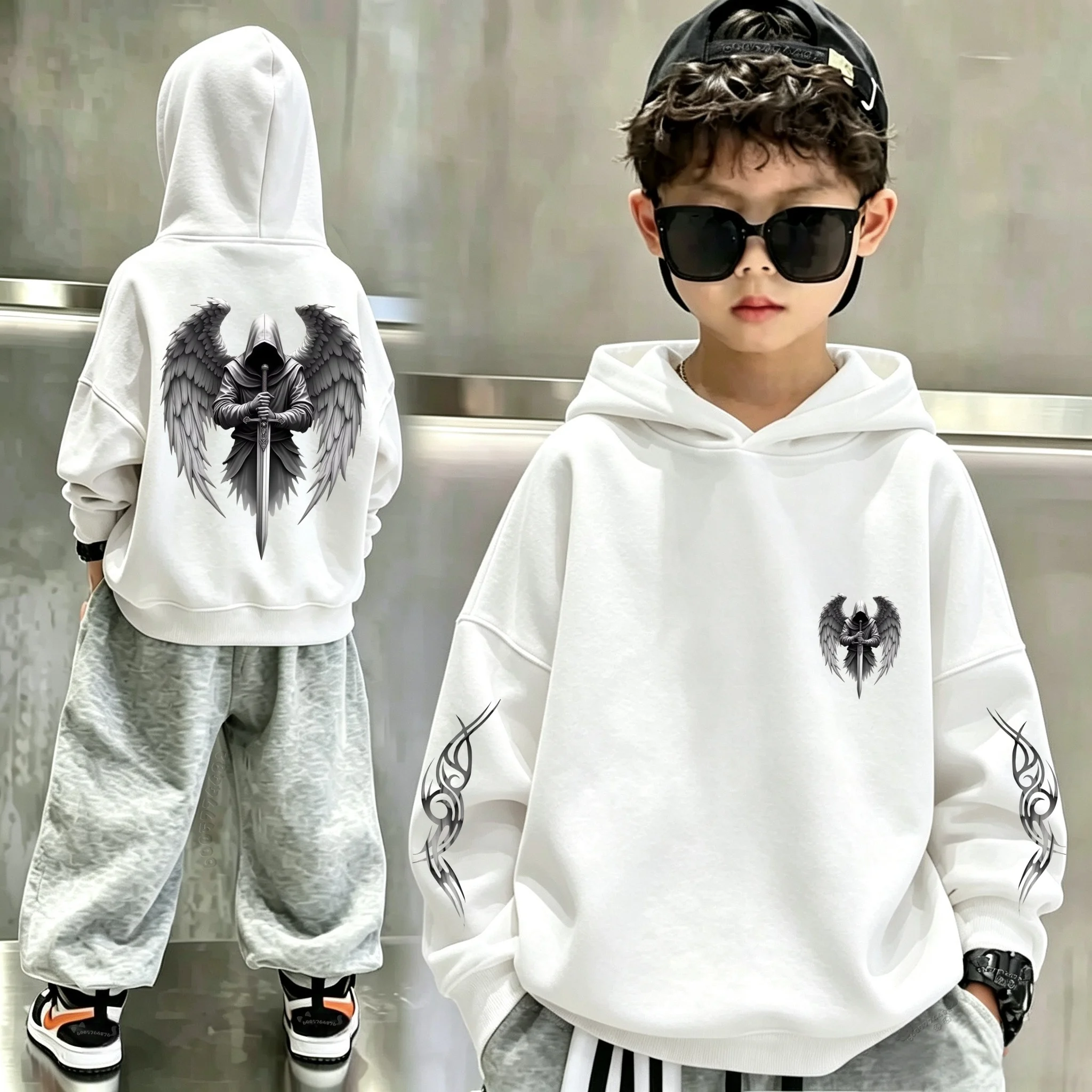Latest dark-themed angel-wing sword-wielding warrior print children's hooded sweatshirt. Trendy long-sleeved t-shirt.